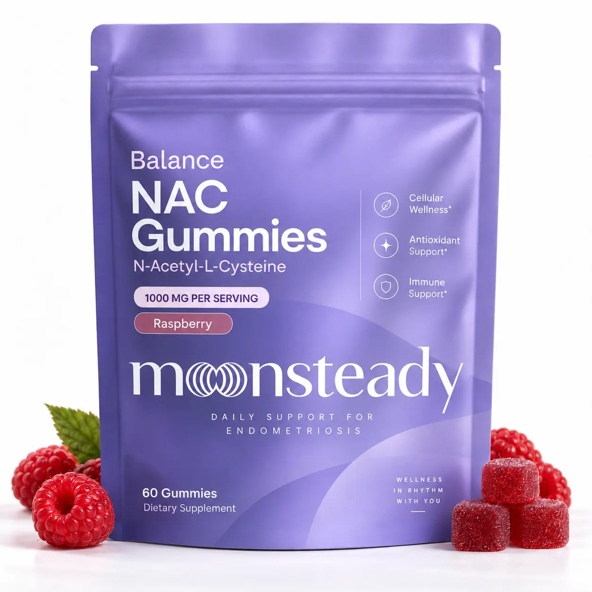 A purple stand-up pouch of Monsteady Balance NAC Gummies (Raspberry flavor) surrounded by fresh raspberries on a white background.